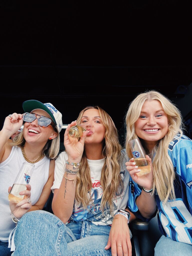 carly pearce at tennessee titans game with friends